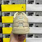 Beige Balenciaga sneaker heel with logo patch and '40' graphic