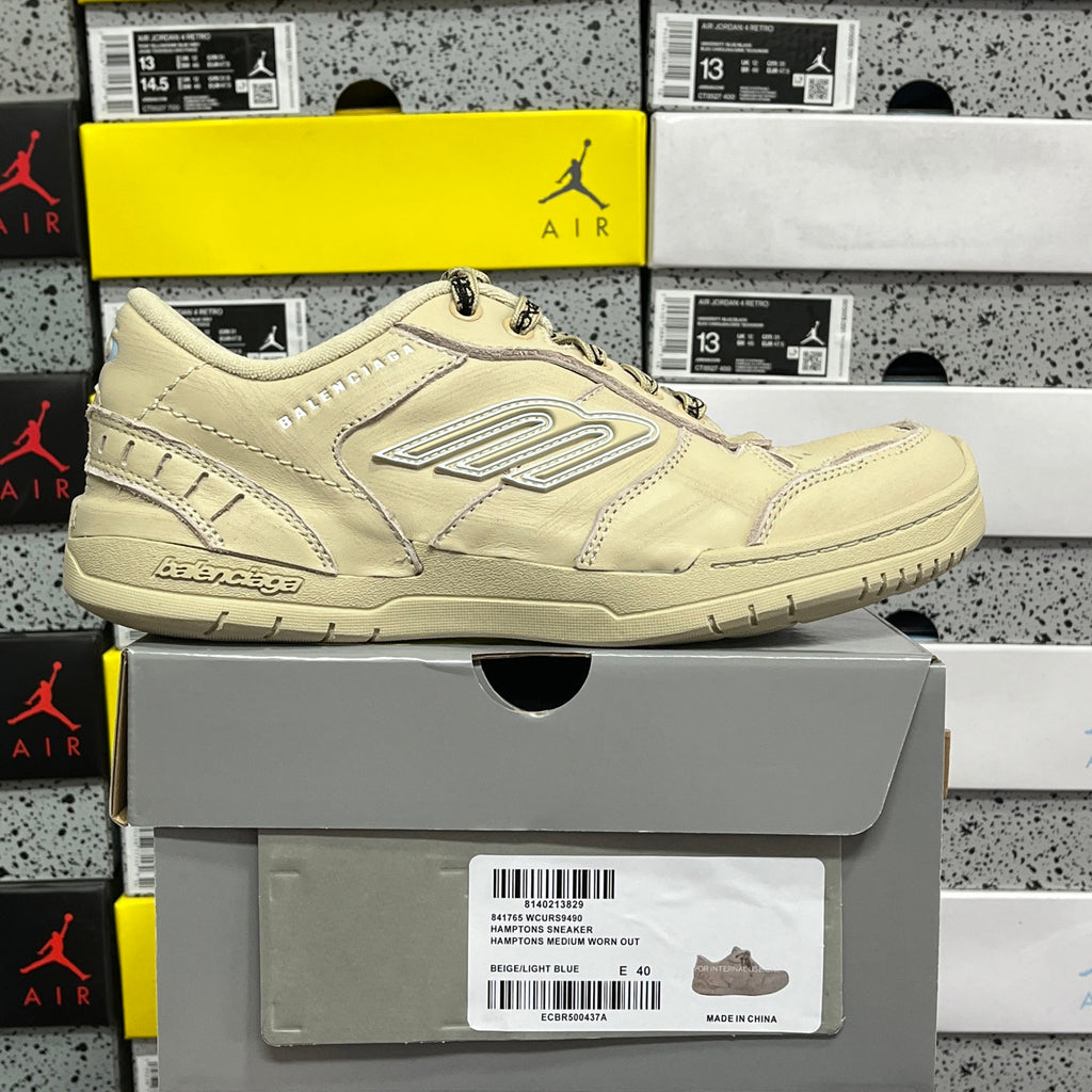 Beige Balenciaga low-top sneaker, side profile with lace-up closure and logo