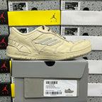 Beige Balenciaga low-top sneaker, side profile with lace-up closure and logo