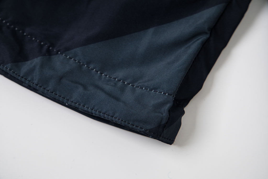 Fendi long hooded jacket bottom hem with seam stitching in dark blue