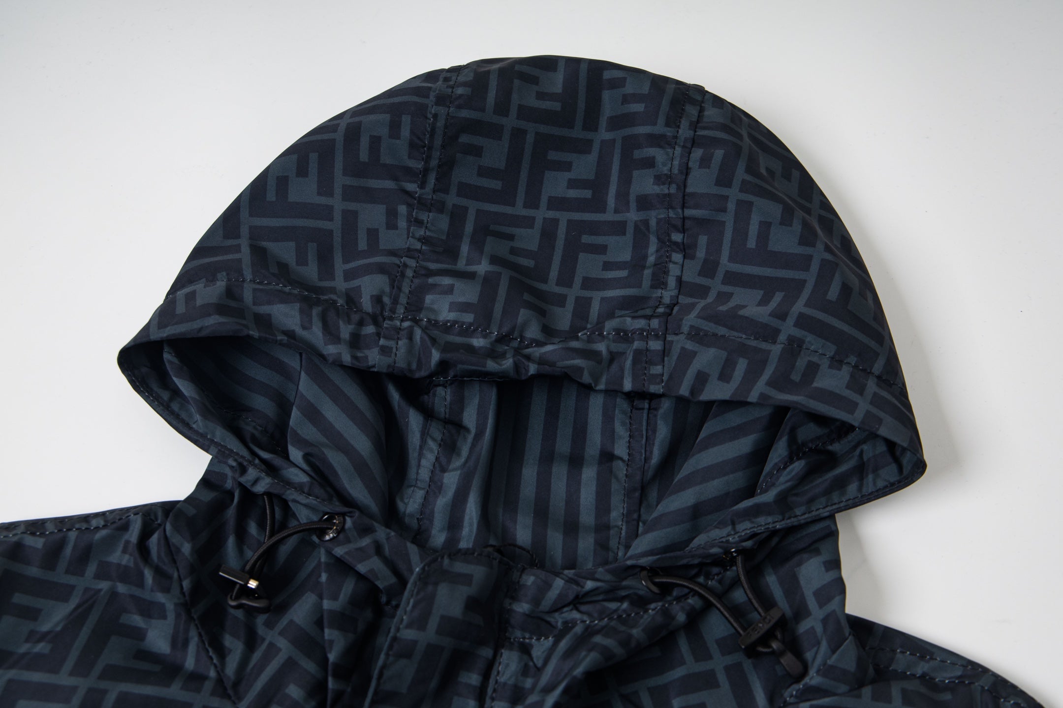 Fendi hooded windbreaker hood with FF monogram lining and drawstring edge
