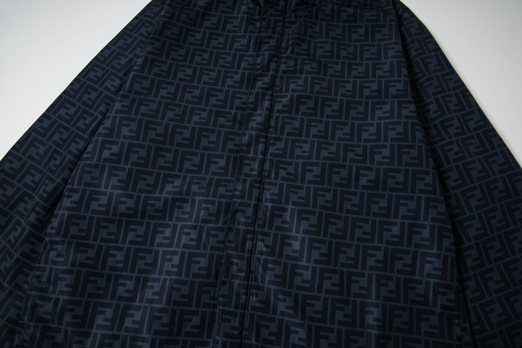 Fendi hooded windbreaker back panel with vertical seams and FF monogram print
