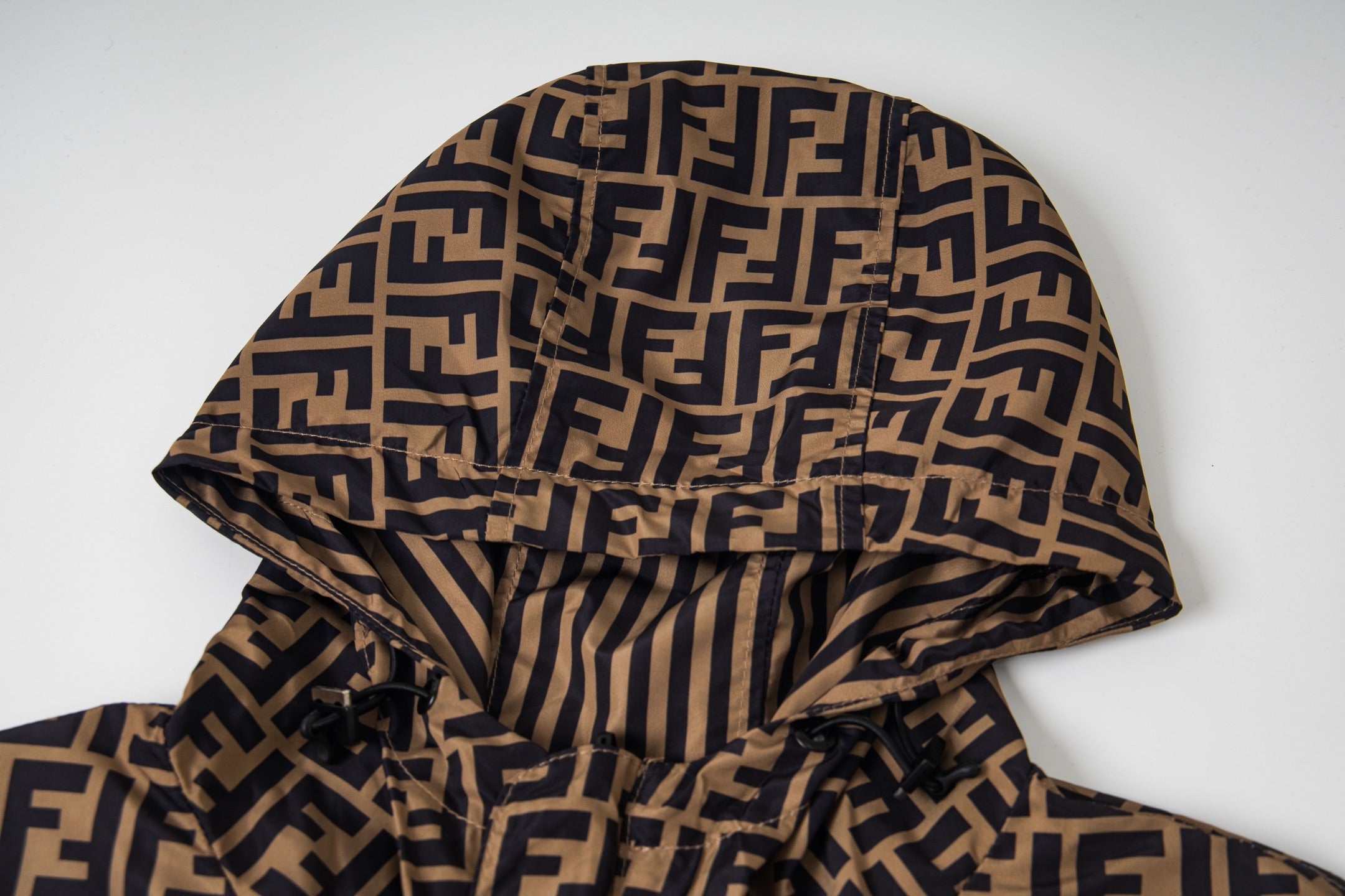 Fendi hood with FF logo outer and striped lining