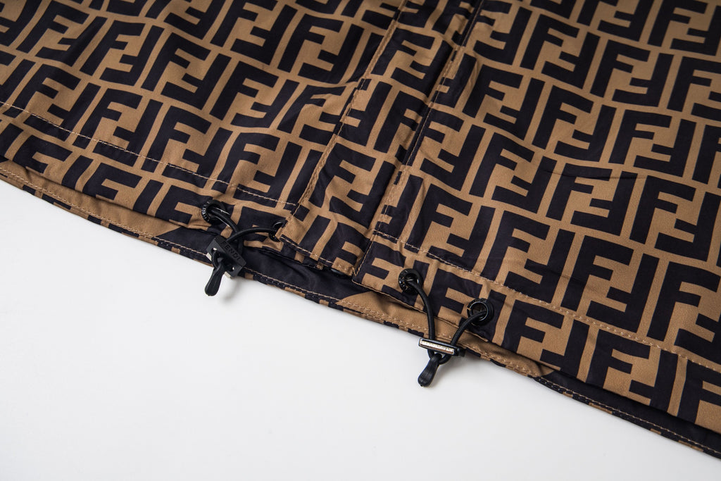 Fendi jacket hem with adjustable toggles over FF monogram fabric