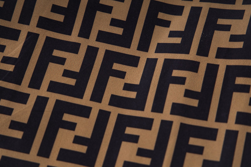 Fendi FF monogram fabric close-up in dark and tan