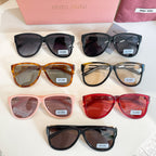 Assorted MiuMiu sunglasses with mixed frame colors and tinted lenses
