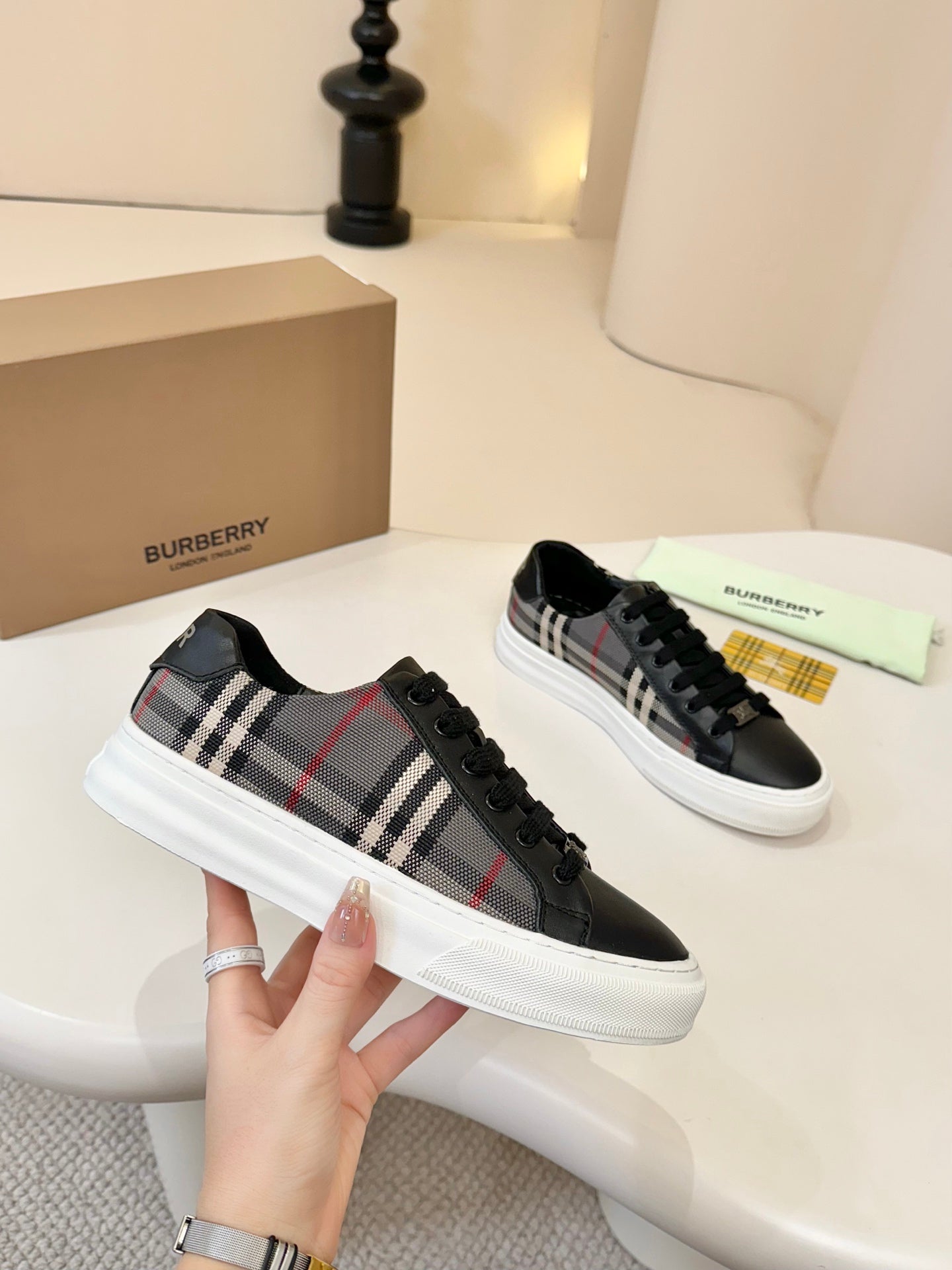 Burberry low-top sneakers, plaid fabric side panels with black trim and laces