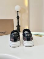 Burberry low-top sneakers back view, black heel with 'BUR' logo detail