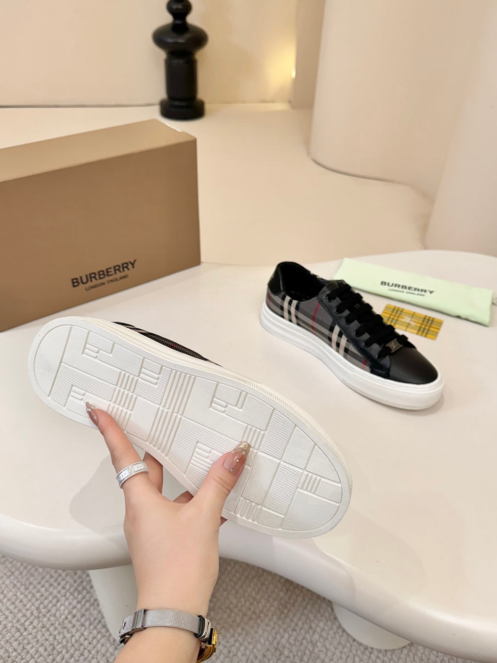 Burberry low-top sneakers outsole view, white rubber sole with tread pattern