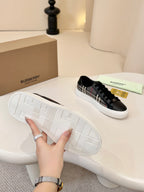 Burberry low-top sneakers outsole view, white rubber sole with tread pattern