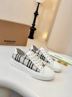 Check-panel low-top sneakers in white with lace-up front and rubber sole
