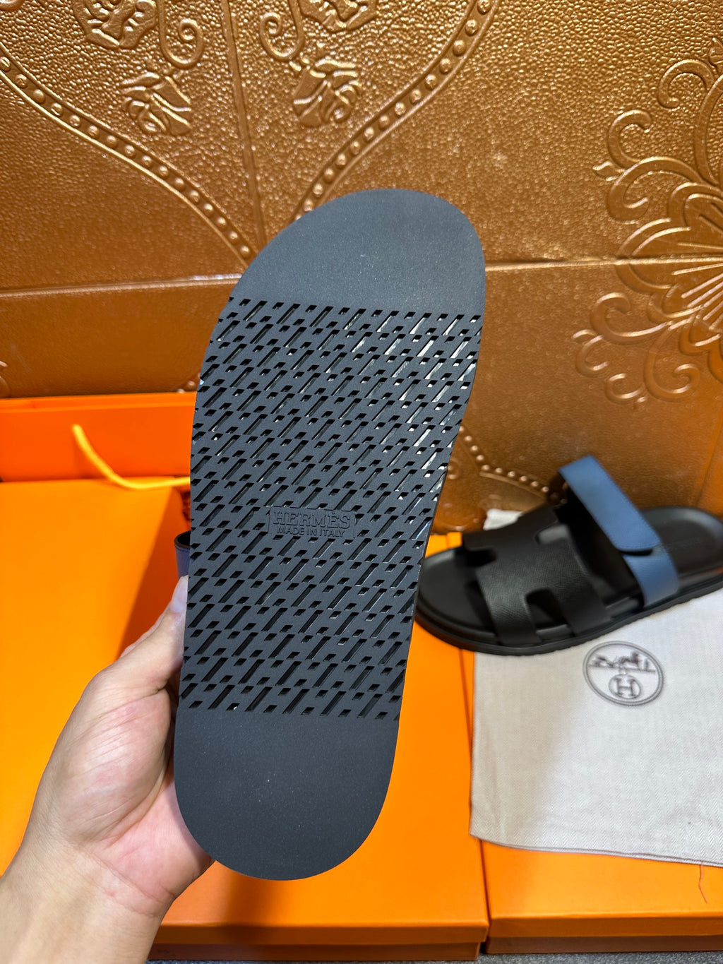 Hermes sandal outsole, textured dark rubber sole with heel tread