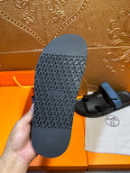 Hermes sandal outsole, textured dark rubber sole with heel tread