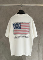 White short-sleeve T-shirt with back patriotic graphic and “Chrome Hearts” text