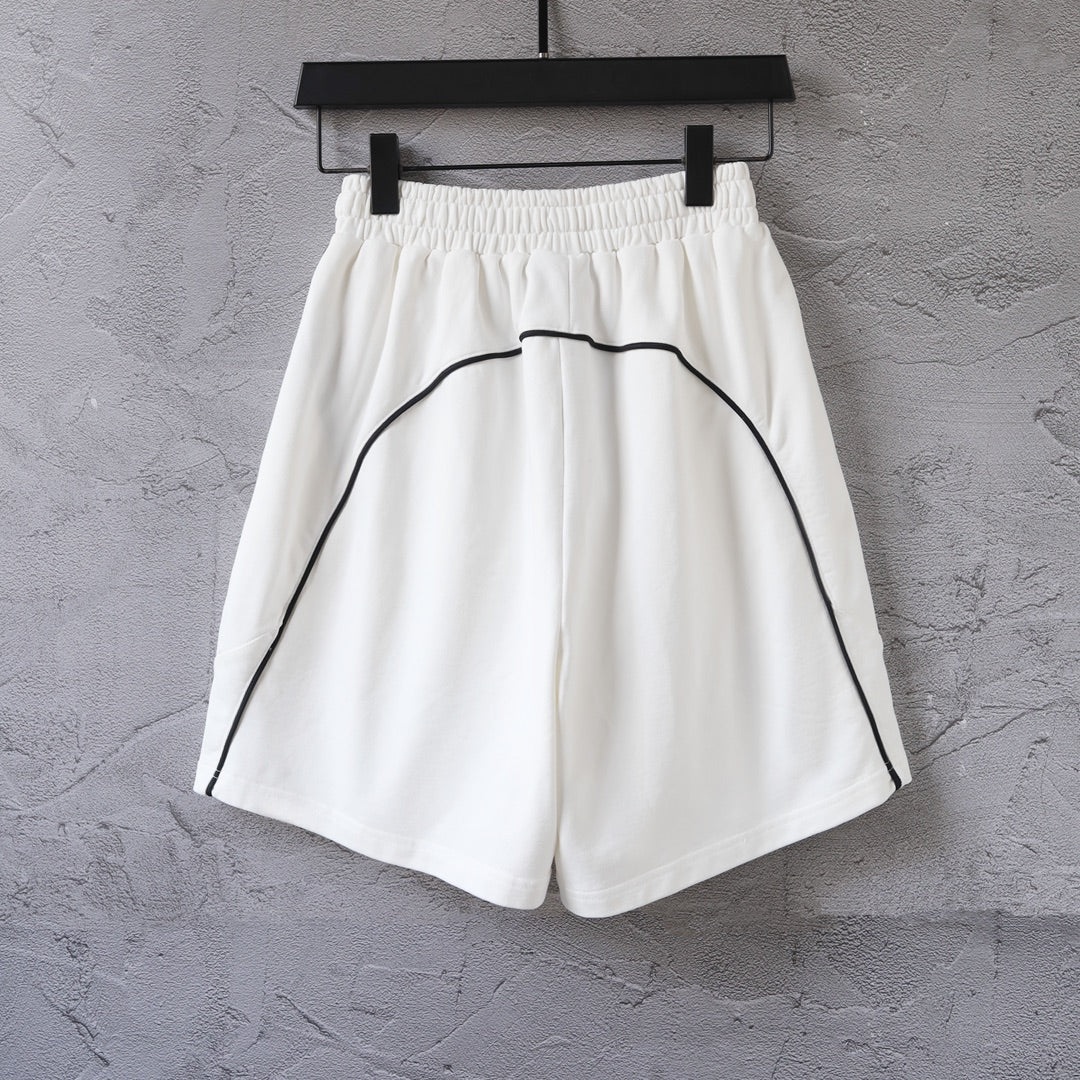 White shorts with elastic waistband and curved side logo print