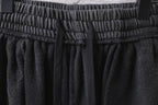Balenciaga pants, dark gray shorts with elastic waistband and pleated front