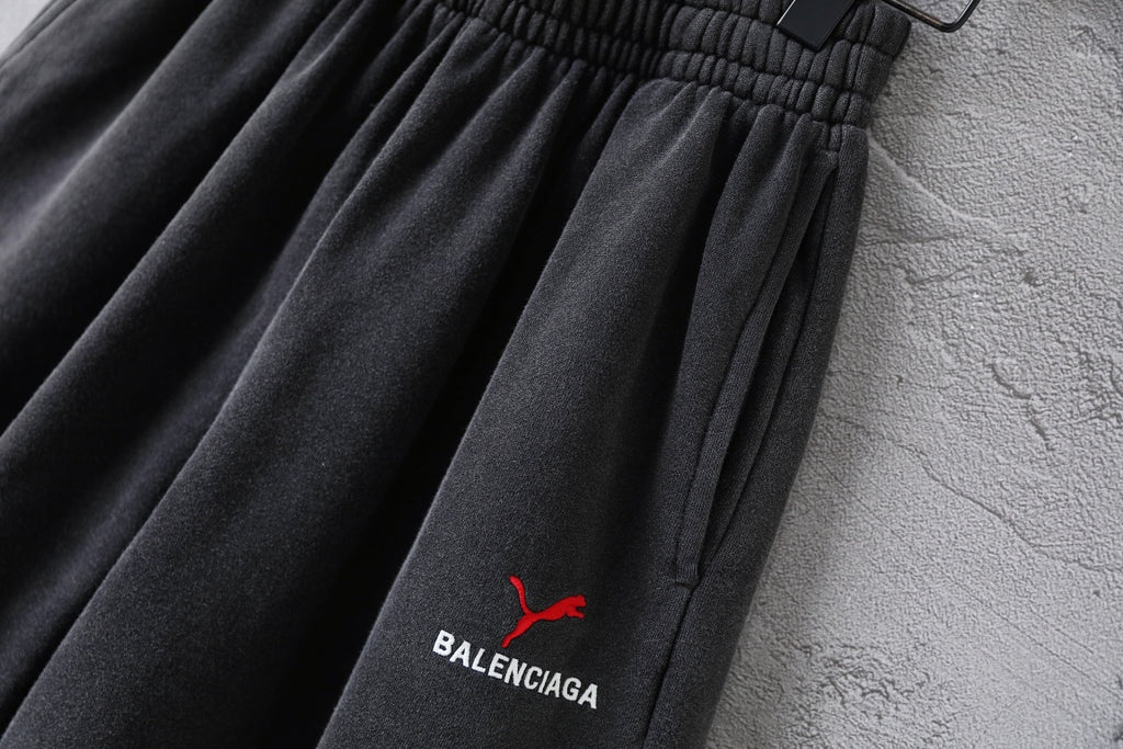 Balenciaga pants, dark gray shorts with embroidered red puma and BALENCIAGA logo