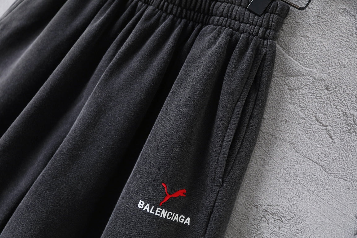 Balenciaga pants, dark gray shorts with embroidered red puma and BALENCIAGA logo
