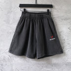 Balenciaga pants, dark gray elastic waist shorts with red BALENCIAGA logo at front