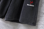 Balenciaga pants, dark gray pleated shorts with curved stitched hem edge
