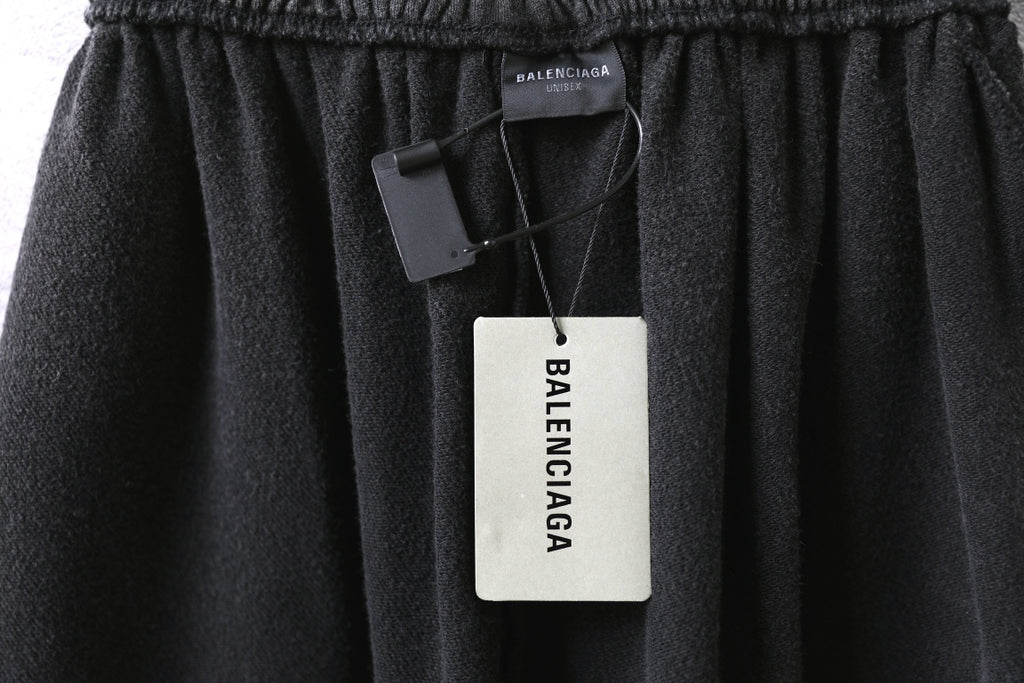 Balenciaga pants, dark gray elastic waist shorts with hanging BALENCIAGA tag