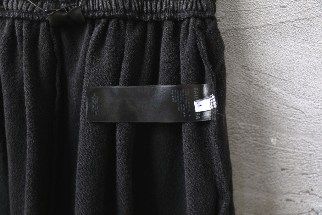 Balenciaga pants, dark gray shorts with interior tag and elastic waistband