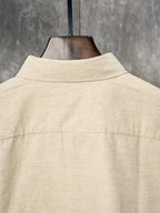 Cream long-sleeve button-up shirt back with standing collar