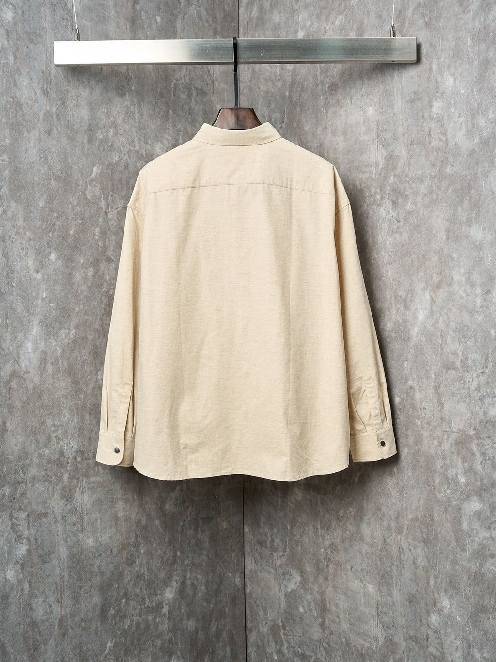 Cream long-sleeve button-up shirt, back view