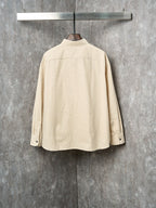 Cream long-sleeve button-up shirt, back view