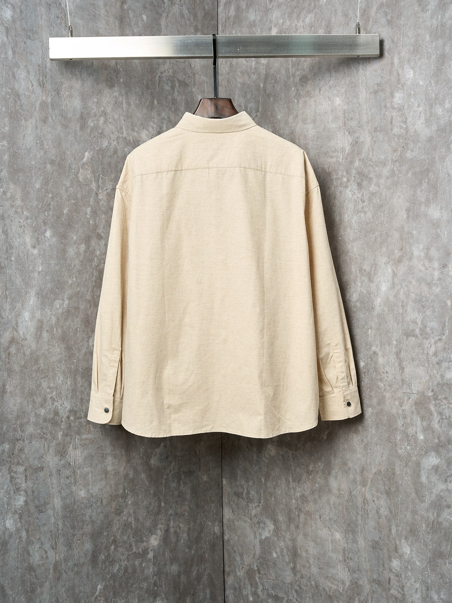 Cream long-sleeve button-up shirt, back view