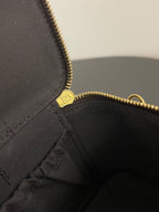 Fendi mini bag interior lining with logo patch and gold zipper trim