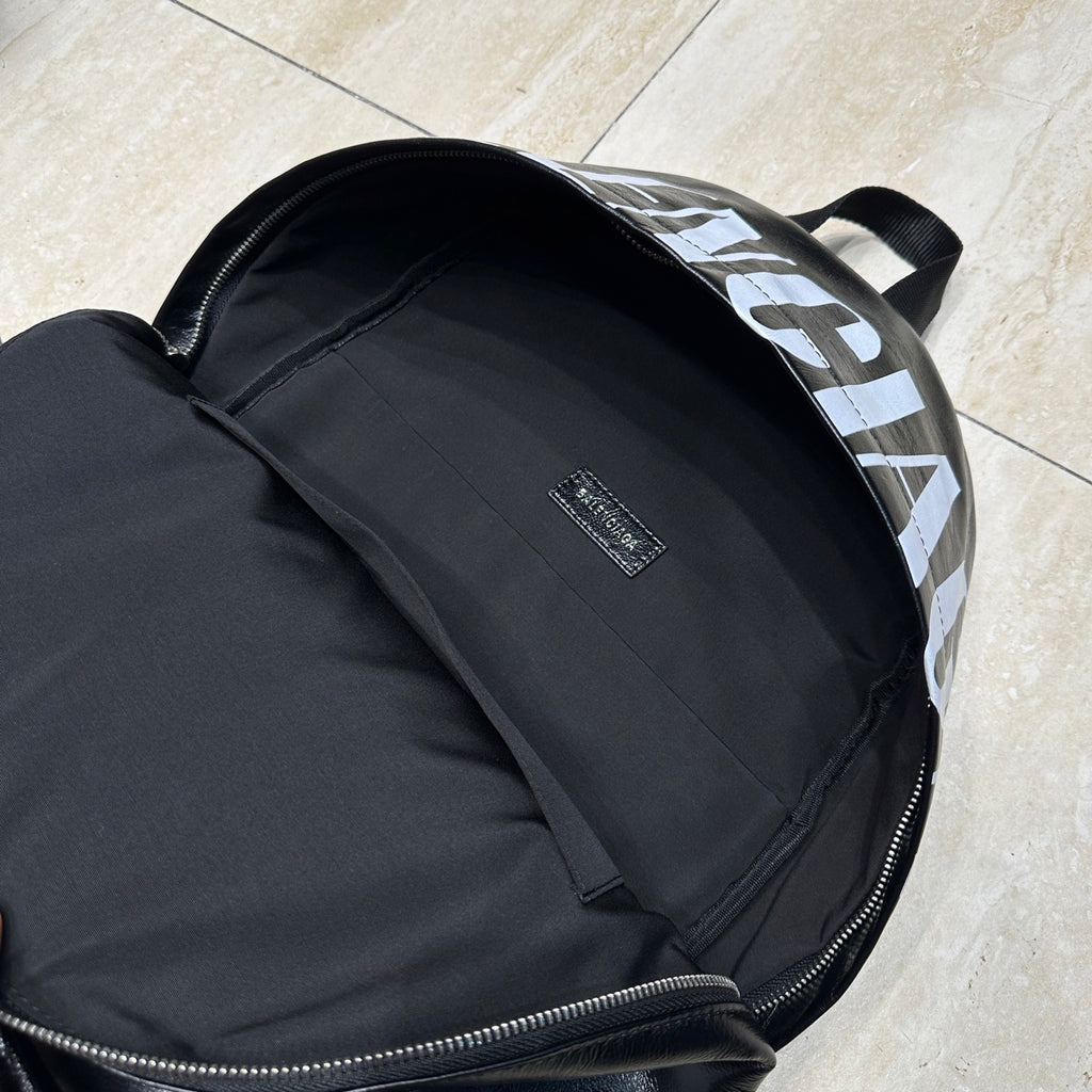 Balenciaga men’s backpack interior lining with brand label near top zipper