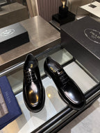 Prada unisex leather lace-up shoes, black glossy upper, lace-up front view