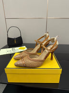 Tan woven heeled sandals with ankle strap and high stiletto heel, beige insole.