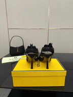 Fendi ladies heeled sandal shoes, rear view of black textured slingback with stiletto heel
