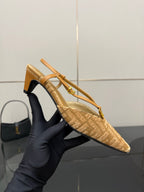 Fendi ladies heeled slingback shoes on foot, tan jacquard with gold strap and heel