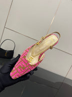 Fendi ladies slingback heels, side view of pink patterned upper with gold buckle