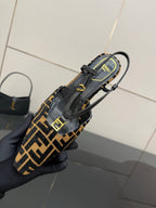 Fendi FF-pattern slingback heels close-up of ankle strap and logo