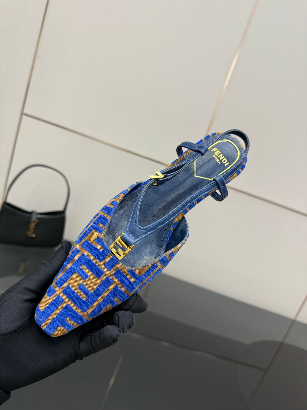 Blue Fendi logo-pattern slingback pump with ankle strap, top view