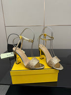 Fendi women's heeled sandals with gold glitter straps and ankle-strap look