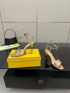 Fendi women's heeled sandals with gold glitter straps and tall square heel