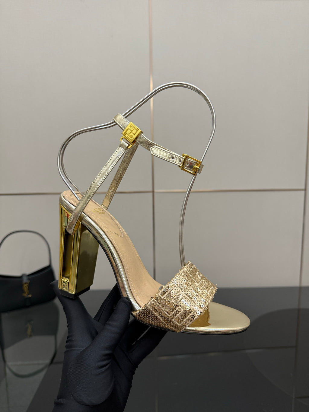 Fendi women's heeled sandals with gold glitter strap and tall block heel