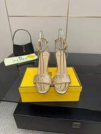Fendi women's heeled sandals with gold glitter straps and open toe