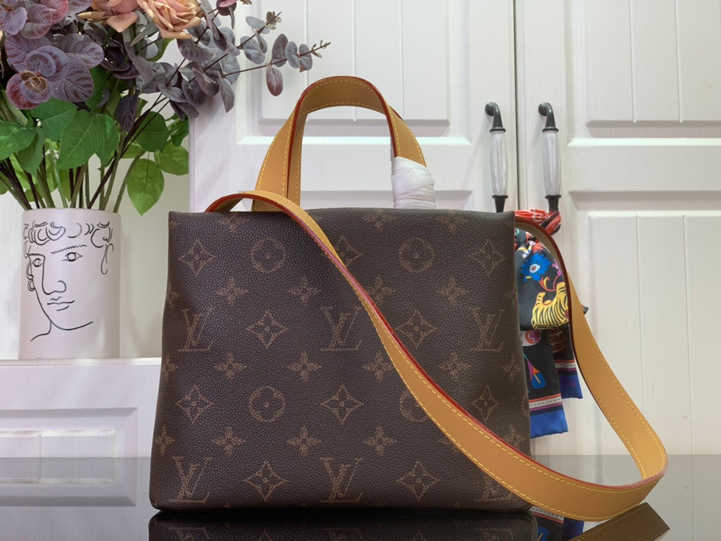 Louis Vuitton bag with tan shoulder strap and top handle, dark brown monogram canvas
