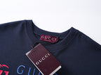 Navy T-shirt neckline with Gucci brand label and attached hang tag