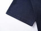 Navy T-shirt sleeve and hem with double-stitched finish