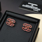 Chanel earrings with red enamel CC logo on gold-tone round backs