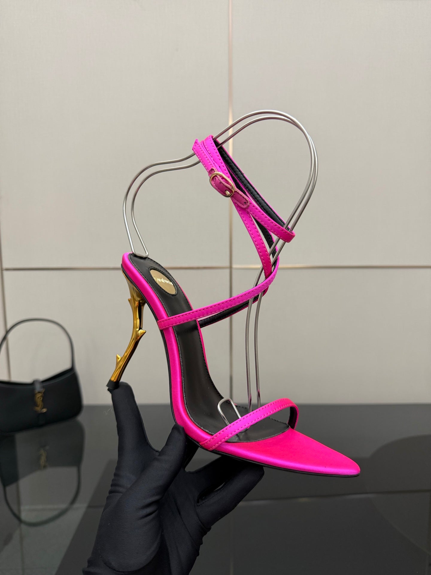 Womens YSL strappy stiletto heel, hot pink toe with black straps and gold heel