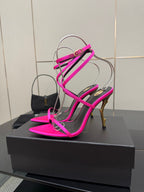 Womens YSL strappy stiletto heels, hot pink with black straps and gold heel