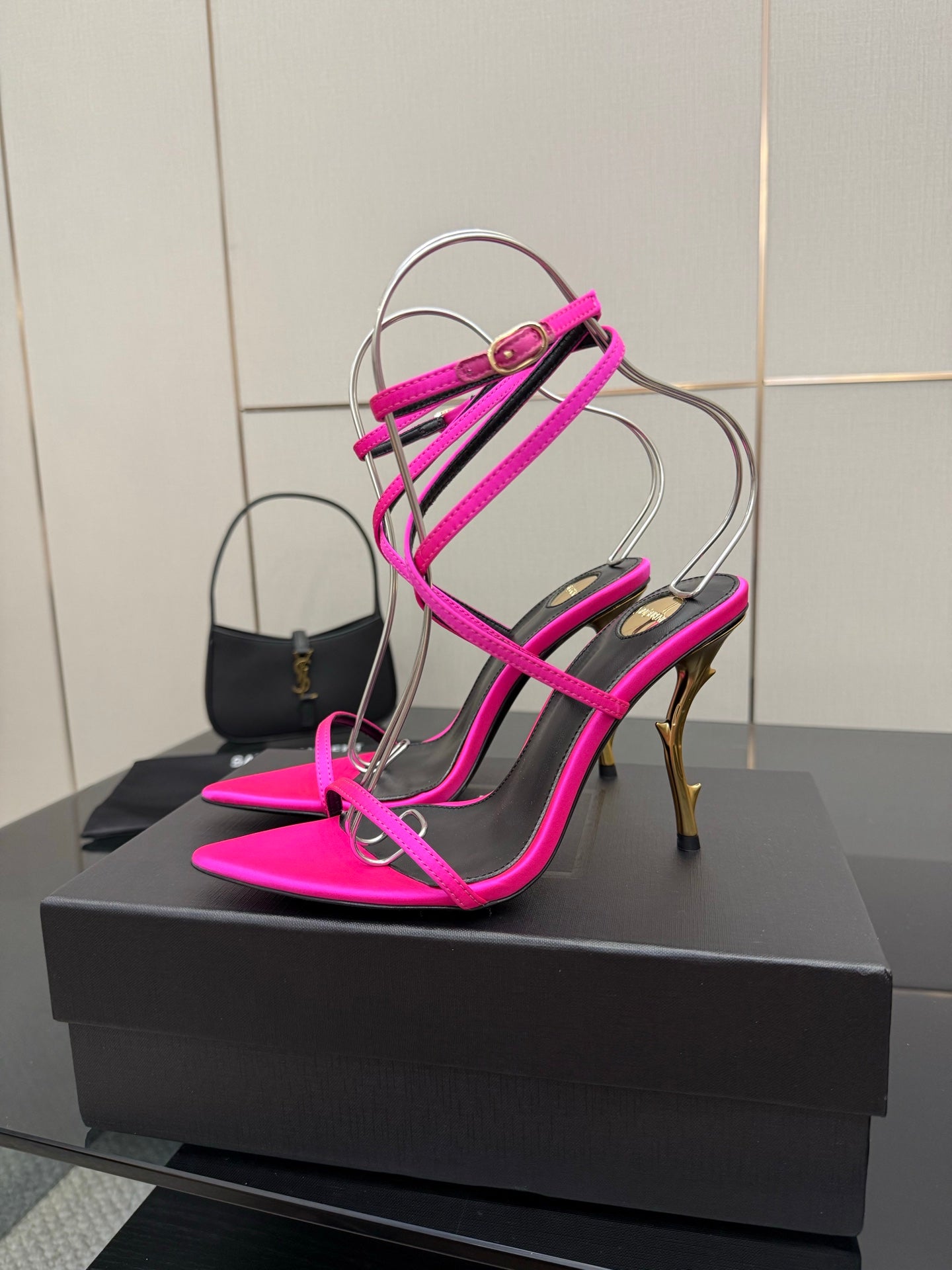 Womens YSL strappy stiletto heels, hot pink with black straps and gold heel